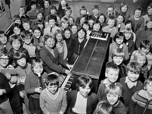 The Alexandra Road School choir pictured in 1980 preparing for a church service and Radio Stoke broadcast. The 70-strong choir was led by Mrs Betty Lyon, believed to be at the piano, ahead of a recording at Shrewsbury Road Methodist Church for transmission on February 3.