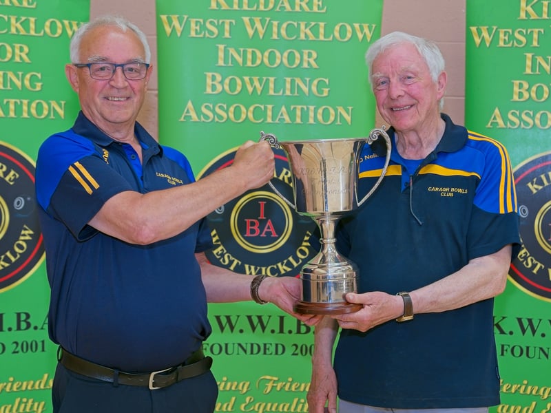 Mixed Triples winners, Liam Meagher and Richard Meagher, of Caragh Bowls Club. Angela Byrne was the third team member.