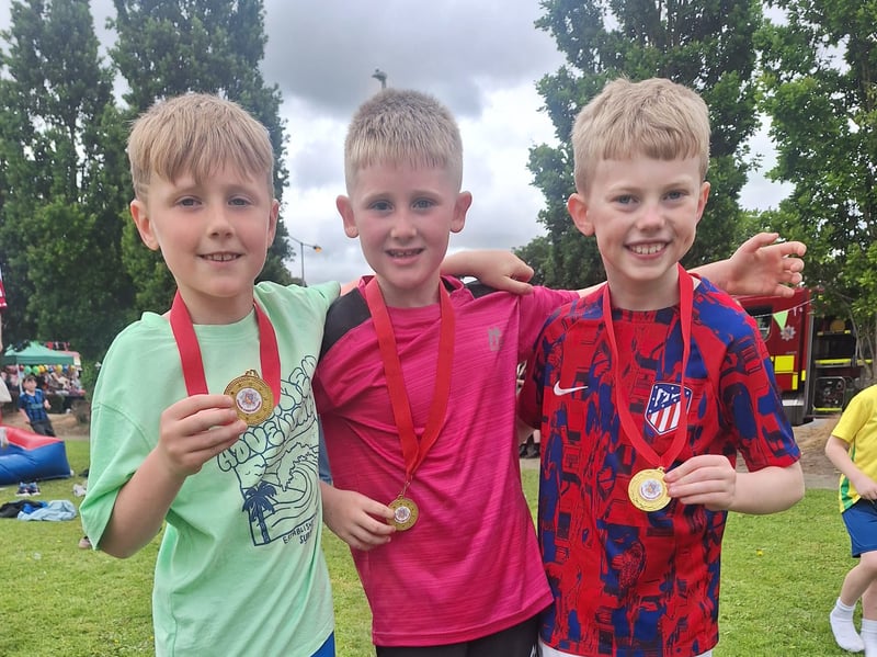 Zac Byrne, Logan Fogarty and Tory Walsh Roche with the medals they won at the Clancy Festival Family Fund Day 