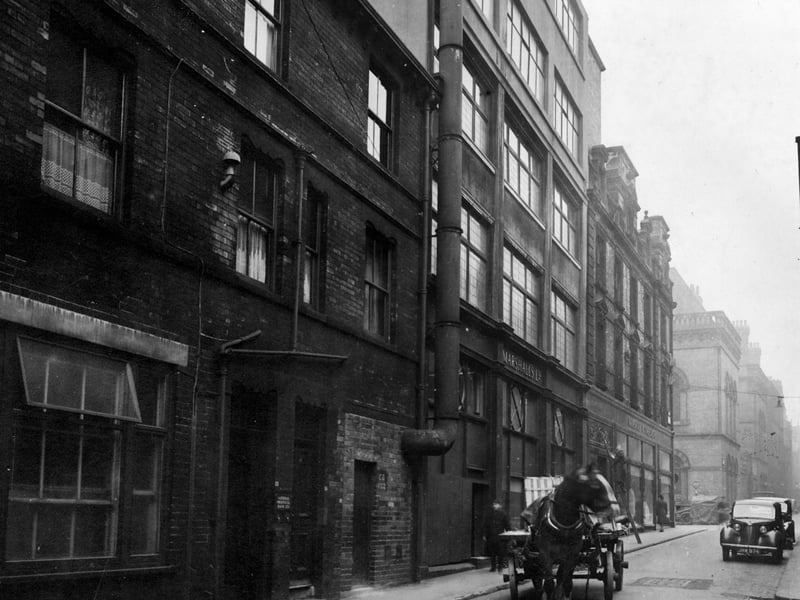 Looking north along Lower Basinghall Street towards Bond Street in December 1946.