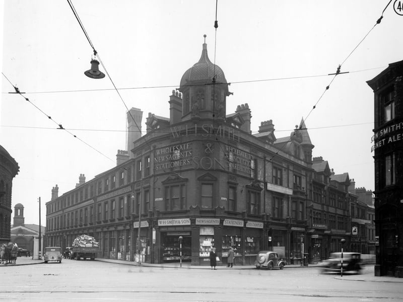 The junction of Call Lane with Cloth Hall Street looking from Duncan Street, WH Smith and Son, newsagent and stationers can be seen on corner. The Corn Exchange is just visible on the left.