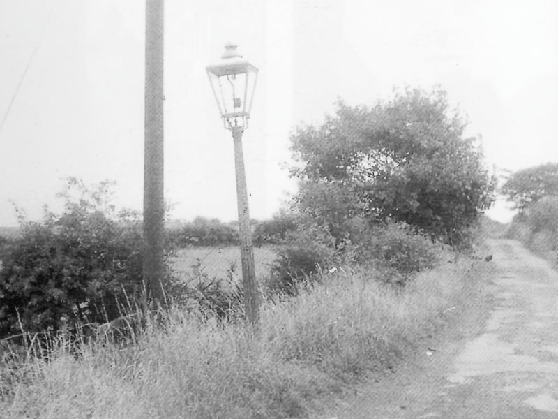 Described in the book 'When the Streets Were Lit by Gas' by Philip Croft Tordoff as a 'little lane just off the main road at Farnley'. It is thought to be Gamble Lane which leads onto Tong Road and looks in the direction of the Beulah Hotel at the top of Farnley. Further towards the Ring Road in the opposite direction Gamble Lane becomes Wood Lane. Pictured in 1977.