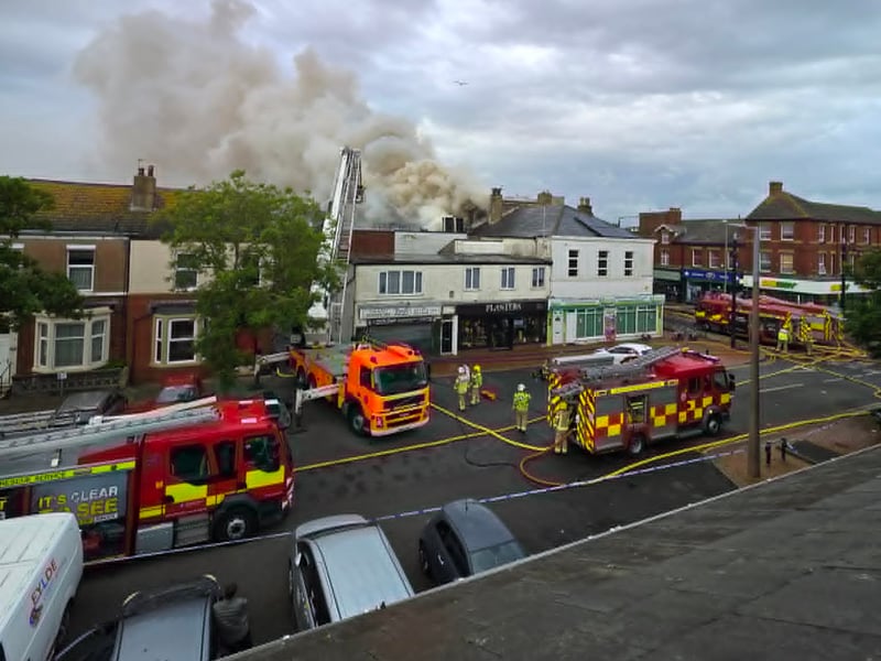 Firefighters are responding to a major fire at the former Ex Catalogue store and M&S in Lord Street, Fleetwood. Huge flames and thick black smoke can be seen billowing across the town