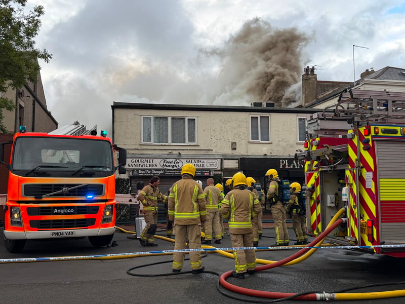 Firefighters are responding to a major fire at the former Ex Catalogue store and M&S in Lord Street, Fleetwood. Huge flames and thick black smoke can be seen billowing across the town