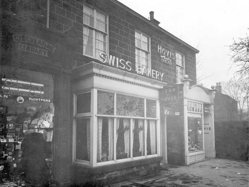 The Swiss bakery and cafe on Otley Road in December 1935. Also in view is part of no 48 Otley Road, A Robinson, stationer, showing goods in the window.