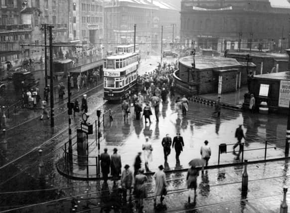 City Square and Wellington Street with the Queens Hotel on the left and the Majestic cinema on the right in May 1946. The Black Prince statue is visible on the far right. The brick air raid shelters built in the square during WW2 were later demolished.