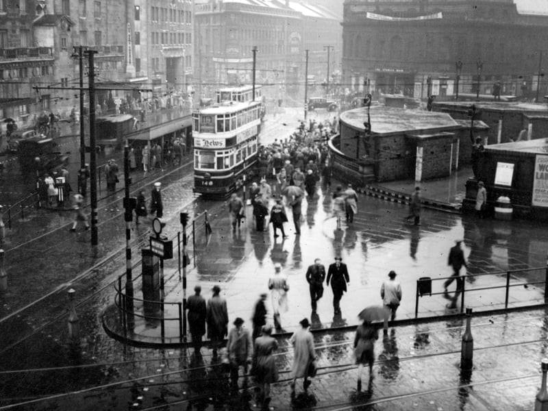 City Square and Wellington Street with the Queens Hotel on the left and the Majestic cinema on the right in May 1946. The Black Prince statue is visible on the far right. The brick air raid shelters built in the square during WW2 were later demolished.
