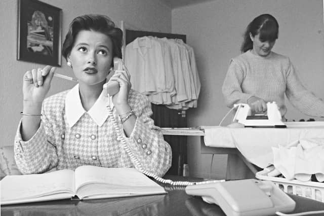 Wolverhampton entrepreneur Samantha Young, 22, takes customer calls at her desk in October 1992 while a colleague carefully irons freshly washed garments in the background. Spotting a gap in the local market, Samantha launched her dedicated ironing service to help busy residents who were "pressed for time." Quickly building up a loyal clientele of around 40 regular customers, her venture captured the vibrant spirit of small-scale enterprise flourishing across the city during the early 1990s. Have you ever used a local domestic service to help save time on the household chores, or did you run a small business in Wolverhampton back in the 90s?