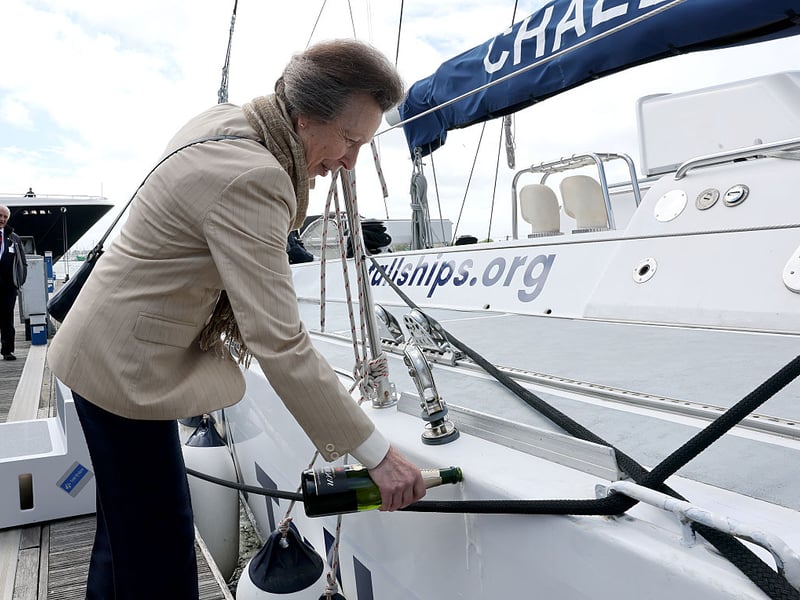 Princess Anne, Princess Royal prepares to pour Champagne on the Challenger 5 yacht during a visit to Tall Ships Youth Trust at Gunwharf Quays Marina on June 04, 2026 in Portsmouth. (Photo by Chris Jackson/Getty Images for Tall Ships Youth Trust)
