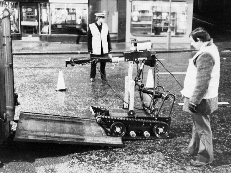 Goliath, the Army's robot device for dealing with terrorist bombs is put back into it's trailer after  a bomb scare on Vicar Lane in February 1977.