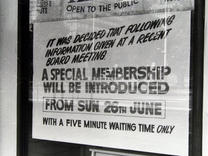 A poster detailing new membership requirements at The Tatler Cinema Club on City Square in June 1977.