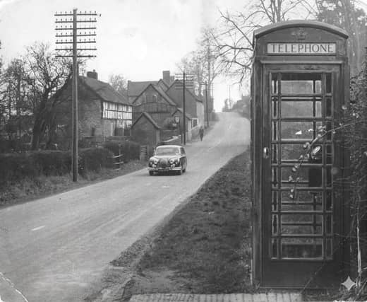 A striking 1960 view of Richards Castle, where a humble telephone kiosk stands on the boundary between Shropshire and Herefordshire near Ludlow. Dated March 1960, the image reflects local debate at the time over proposed changes to the county border, with the village caught between two identities. Once described as a line that might “claim” the community for Shropshire, the boundary issue clearly stirred strong feelings among residents.