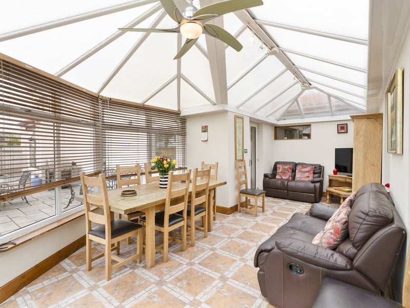 Furthermore, there is a large, multi-purpose conservatory with floor space for comfy lounge furniture and an 8-person table. It connects to the indoor pool and enjoys a suntrap, southeast-facing aspect with inspiring garden views.