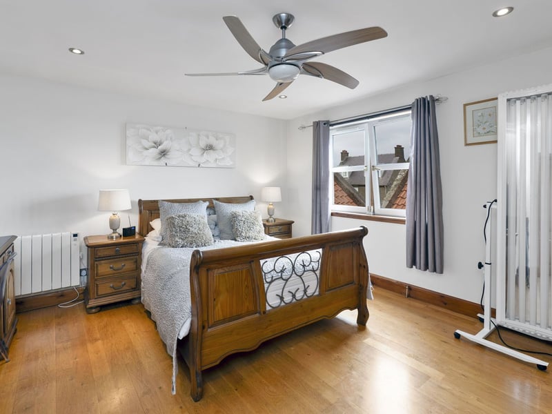 Located on the ground floor, the large principal suite has a prime setting directly opposite the indoor pool – perfect for a quick dip in the morning.