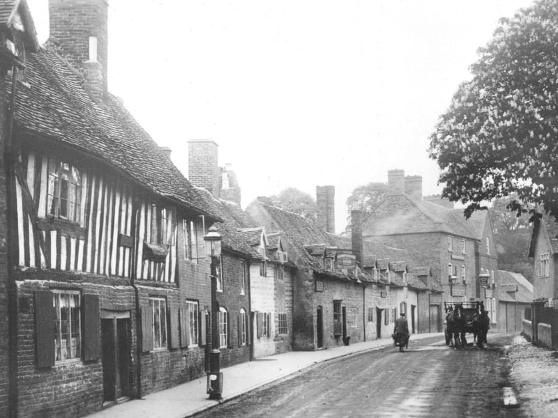 A charming view of Mill Street, Bridgnorth, thought to date from the 1920s, when the town's historic streets were alive with the rhythms of everyday life. Lined with familiar buildings and bustling with local activity, the scene captures a bygone era and offers a fascinating glimpse into how one of Shropshire's most distinctive streets once looked.