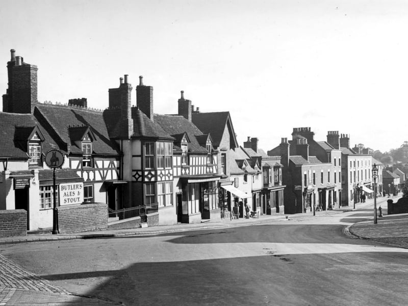 A glimpse of Broseley High Street as it looked around 1938, capturing a quieter pace of life in the Shropshire town before the upheaval of war. On the left stands the Elephant & Castle pub, where licensee George F Wall's name can still be made out above the doorway. The scene, preserved on a postcard, offers a fascinating snapshot of everyday life and a streetscape that generations of Broseley residents would have known.