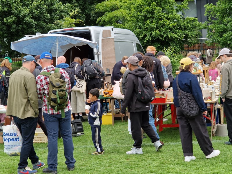 Festival-goers check out the Meadows Festival stalls for a quick bargain buy.