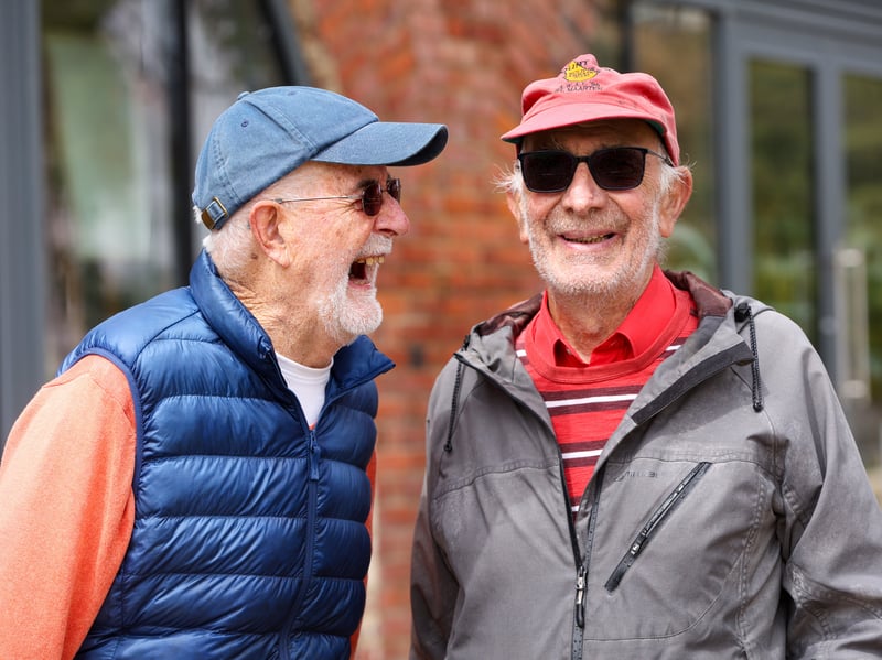 Portsmouth Pride was cancelled due to the weather but it didn't stop John , left, and Peter turning up at the Hotwalls, Old Portsmouth
Picture: Chris Moorhouse (060626-18)