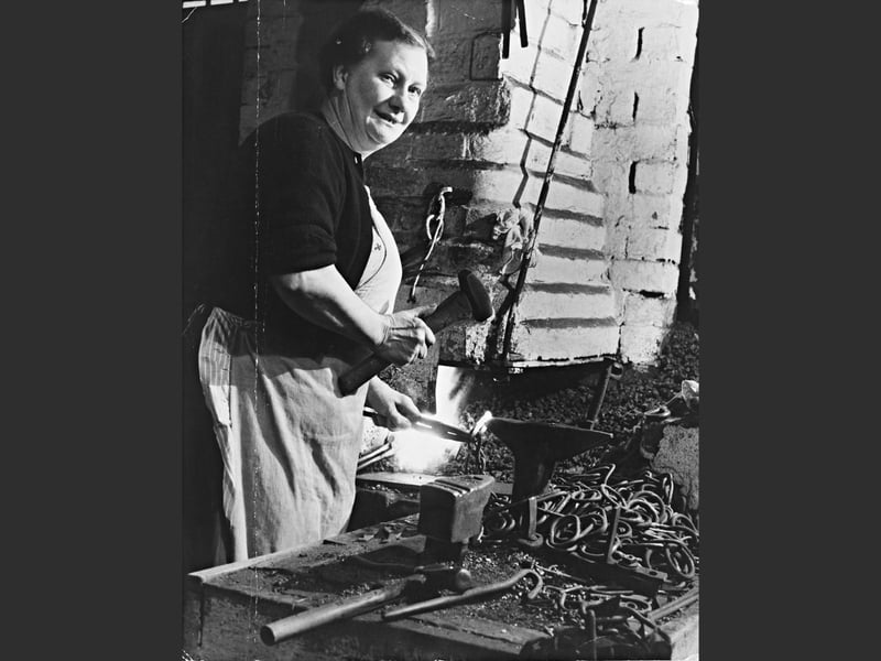 While not invented by a single-person, chain-making was strongly developed in the region. Lucy Woodhall is pictured at work at Joseph Woodhouse, chainmakers, Cradley Heath, in January 1961, offering a glimpse into the demanding world of heavy industry. She said at the time: “Yes, the sparks sometimes hurt my hands or mouth.”
