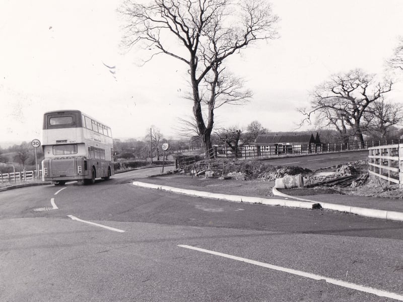 January 1983 and a bus takes the old road into Colton while a new road from the roundabout at the Whitkirk-Selby Road junction remains closed awaiting development in the village.