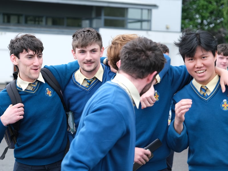Students step in for a photo following last Friday's exam