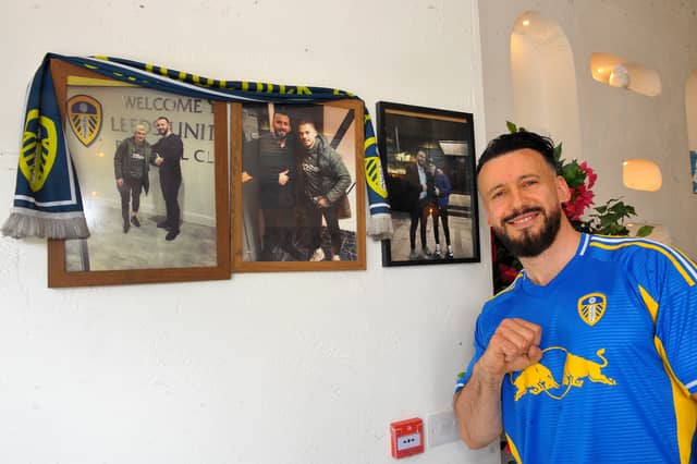Leeds United fan and owner Blerim Lama with his prized pics with Ezgjan Alioski and Kalvin Phillips.