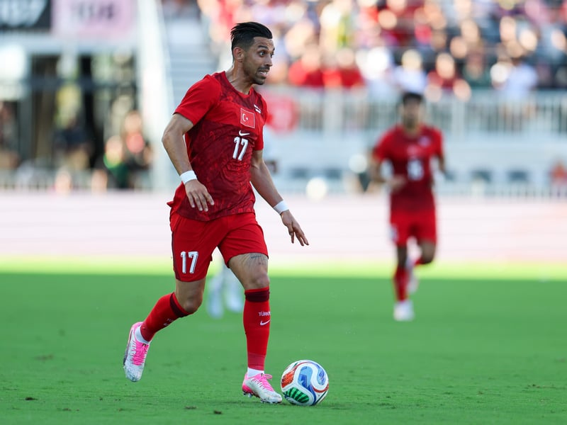 Turkiye have reverted back to their iconic all red kits for the World Cup, and it looks pretty smart. The jersey highlights cultural heritage by blending a vibrant red base with marbled ebru (traditional Turkish paper marbling) details, while the country's iconic star-and-crescent is emblazoned flag on the chest.