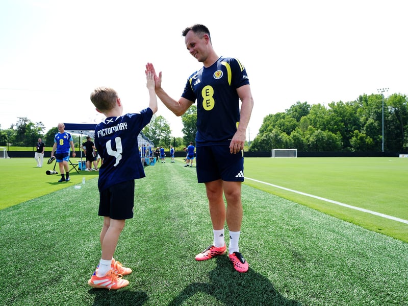 Shankland taking a break to chat with a Scotland fan. 