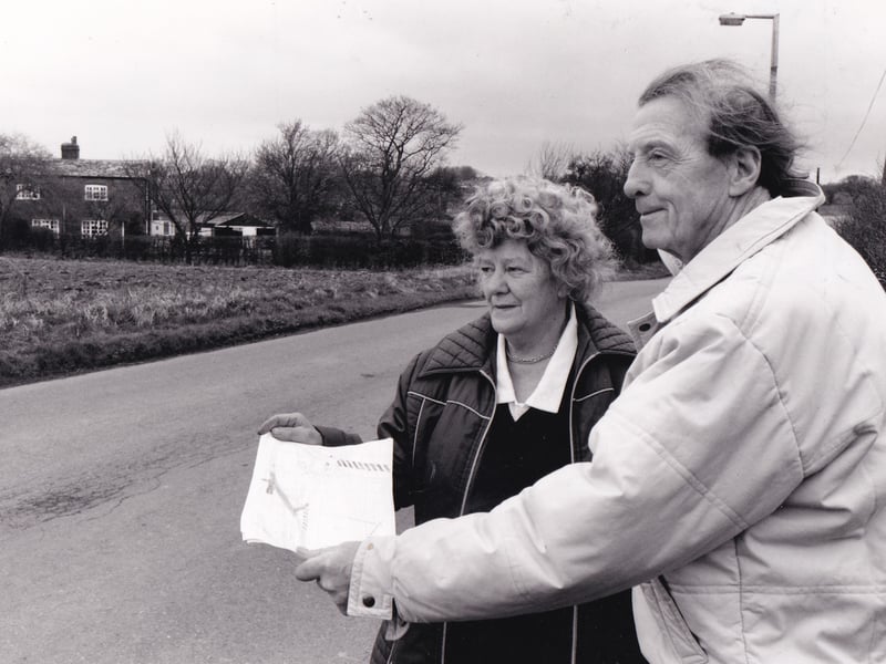 March 1993 and residents feared their quiet country lane would be sliced up by a new juggernaut carrying highway. The new road would be built to serve a supermarket which was being mooted at the junction of School Lane and Selby Road. Pictured are alarmed locals George and Nancy Backhouse.