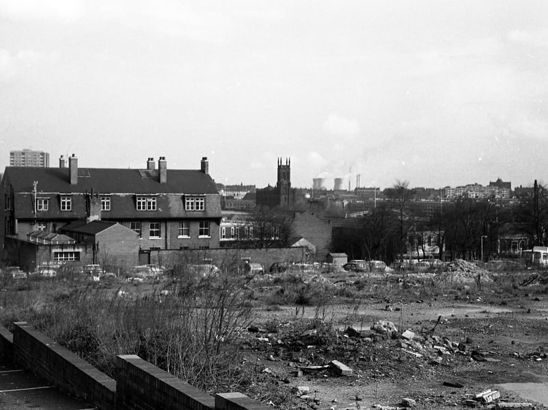 A view taken from the car park of the Hobby Horse pub on Lovell Park Road,in 1970 looking south-east. Wasteground beside the car park has since been redeveloped with new housing. The block of houses to the left still exists on Lovell Park Hill but is now surrounded by new buildings.