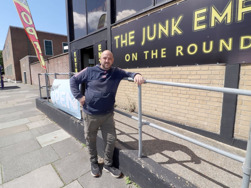 Jon Corbin outside the new Junk Emporium store on Tuesday, June 8.