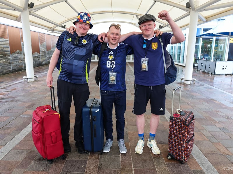 Three Scotland fans get ready for their World Cup adventure.
