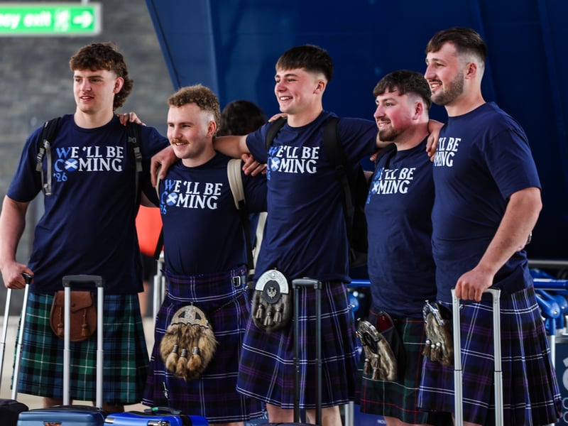 Scotland fans are pictured at Glasgow Airport as they travel to the USA.