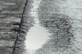 Concerns over material used to fill potholes like this one