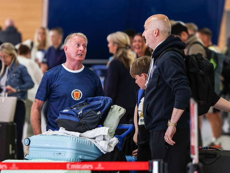 Scotland fans are pictured as they queue to check in at Glasgow Airport as they travel to the United States.