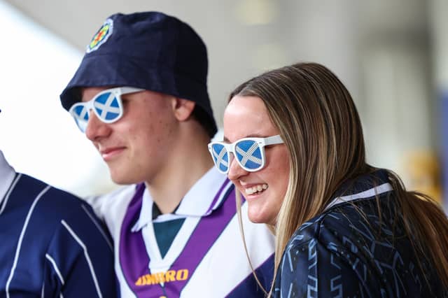 Scotland fans are pictured at Glasgow Airport travelling to the World Cup.