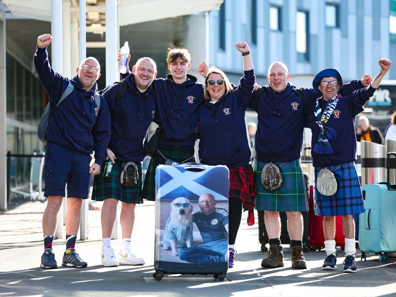 A group of Scotland fans prepare to jet off to the World Cup.