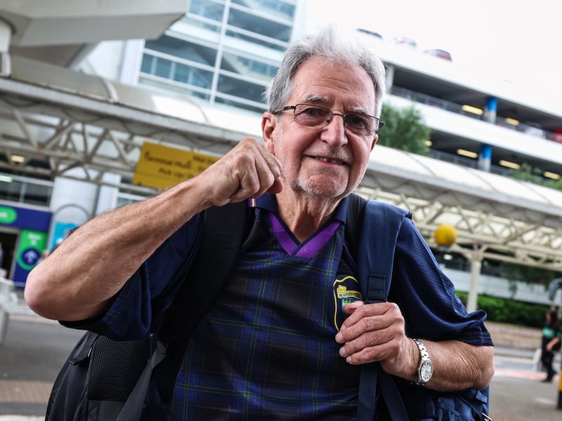 Scotland fans are pictured at Glasgow Airport as they travel to the World Cup in North America.