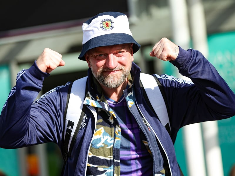 A Scotland fan at Edinburgh Airport getting ready to back Steve Clarke's boys across the pond.