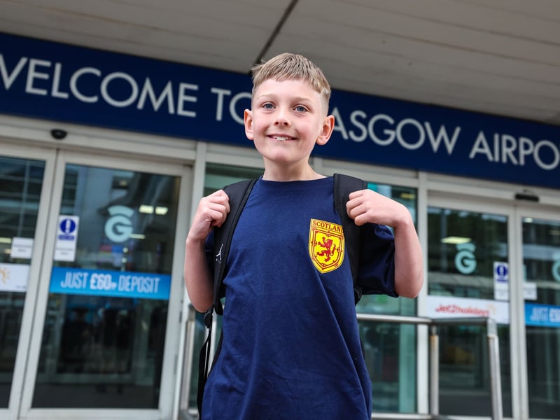 A young Scotland fan on his way to the World Cup.