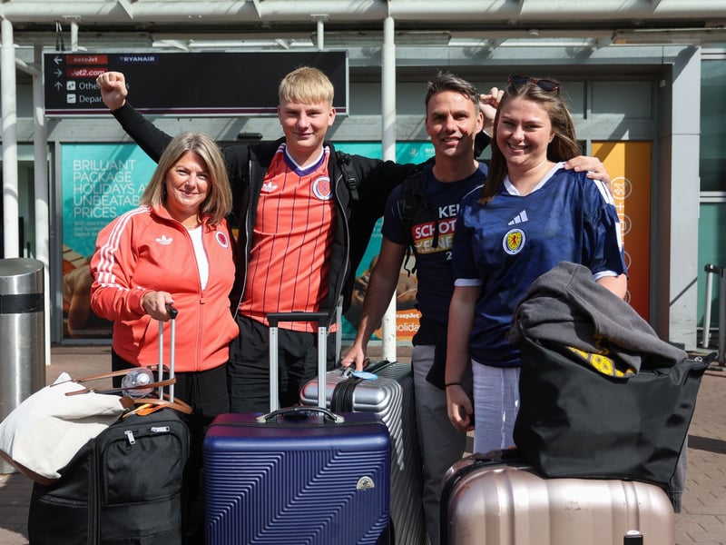Scotland fans are pictured at Edinburgh Airport as they travel to USA.