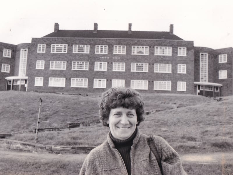 Mary Simpon, acting secretary and welfare officer of Meanwood Tenants' Association pictured outside Bronte House in November 1983. The conditions and vandalism at the block of flats had been described as "disgusting" by the association and ward councillors.