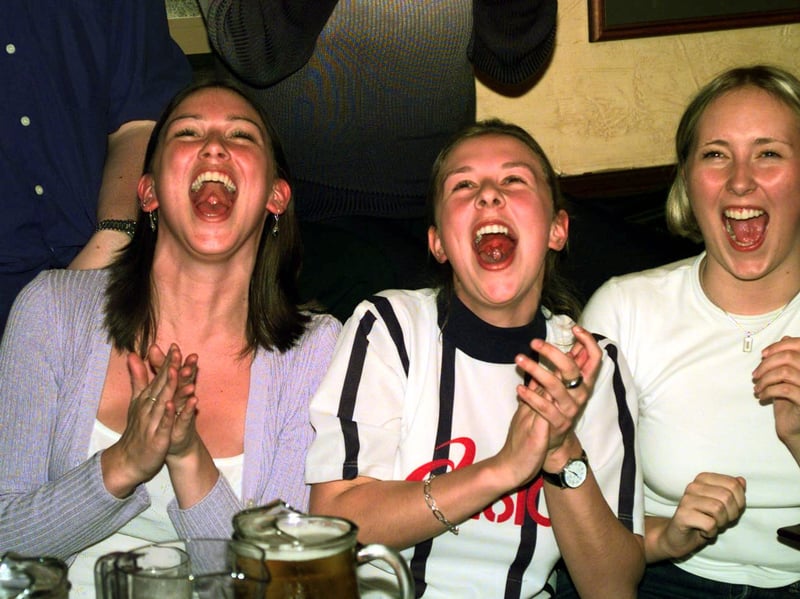 England fans cheer a goal during the England v Argentina clash.
