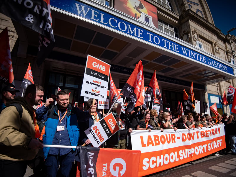 GMB Union members march through Blackpool to demand improvements to the School Support Staff negotiating body from the Government