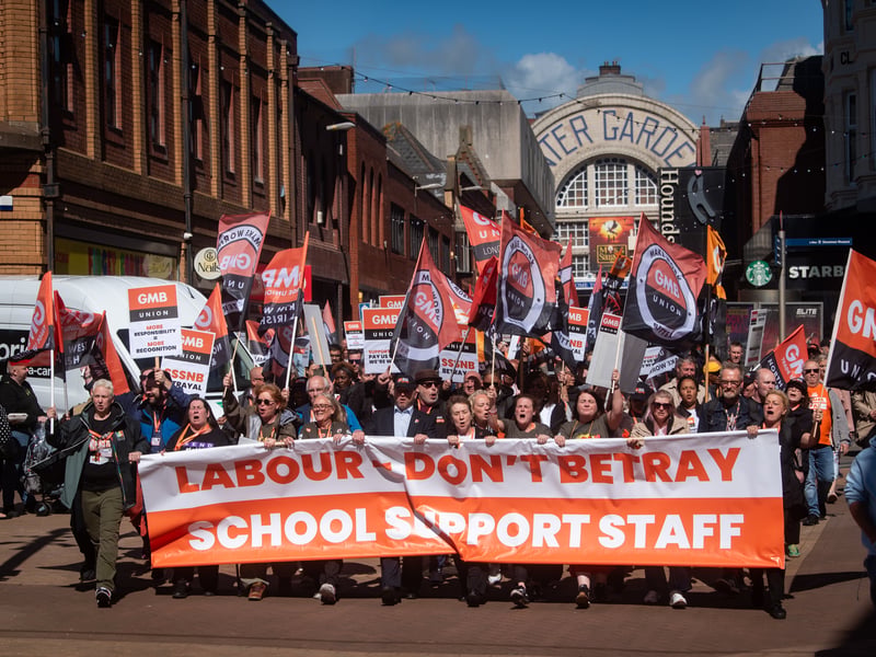 GMB Union members march through Blackpool to demand improvements to the School Support Staff negotiating body from the Government