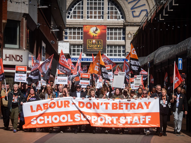 GMB Union members march through Blackpool to demand improvements to the School Support Staff negotiating body from the Government