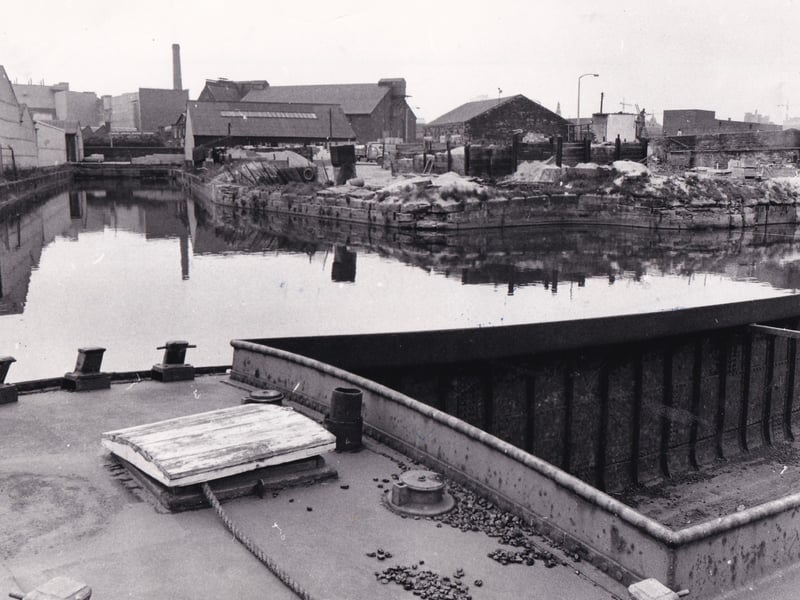 Screening was given as the remedy for hiding this builder's yard in June 1972.