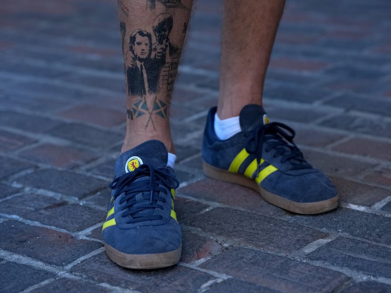 Great trainers, great tattoo. 