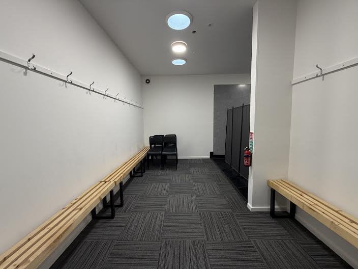 Built to respect its conservation area surroundings and the direct line of sight to the Grade II listed St Chads Church, the building features spectacular glazed bi-fold doors that retract directly onto the matchday action.