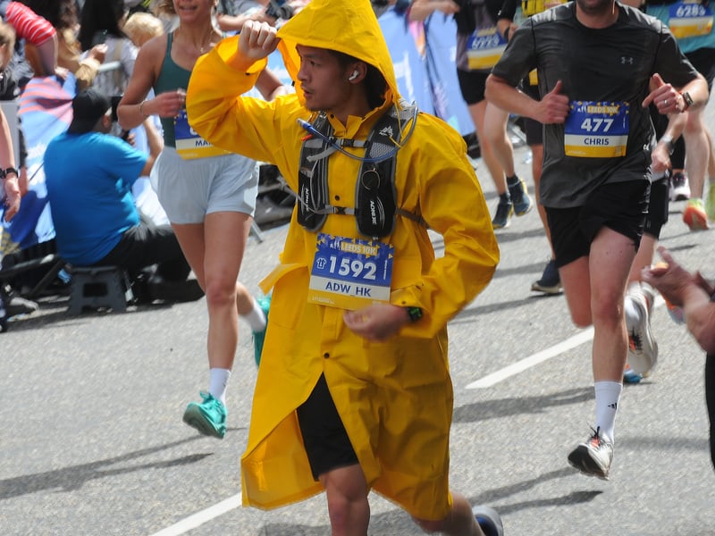 Finishers on The Headrow after a hot run, though this runner was prepared for any eventuality.